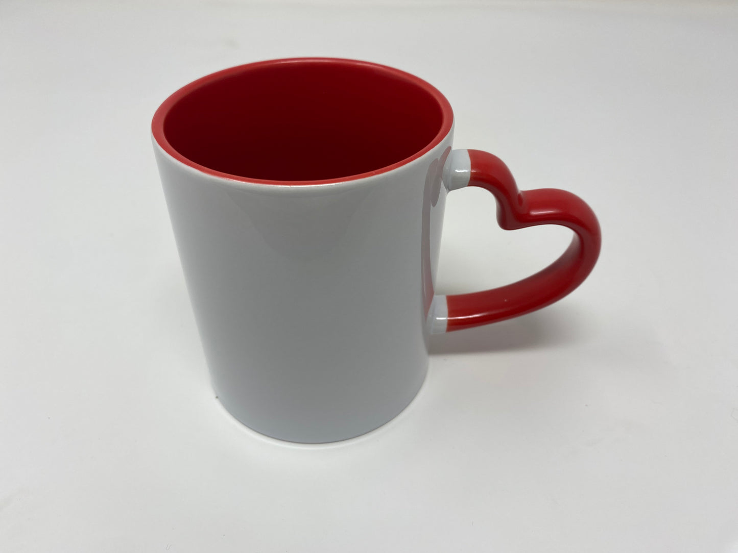 Tazza con manico a cuore colorata